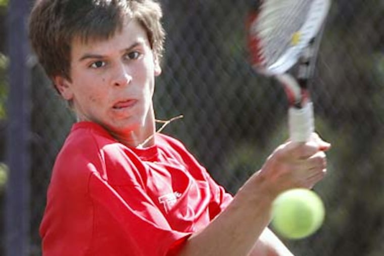 En route to victory, Lenape’s Nikola Kocovic returns a shot to East’s Ross Silverberg in their singles match. (Elizabeth Robertson/Staff Photographer)