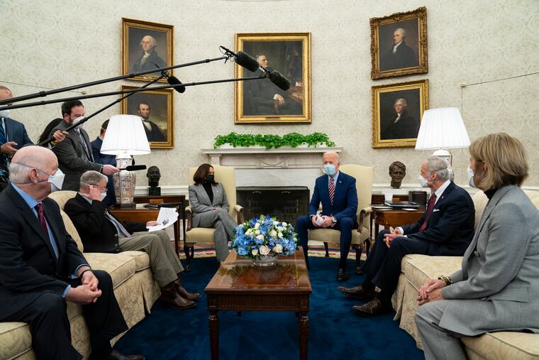President Joe Biden (third from right) speaks during a meeting with lawmakers on investments in infrastructure in the Oval Office of the White House, on Thursday