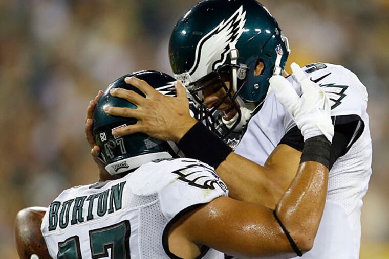 Mark Sanchez celebrates Trey Burton's touchdown with the Packers.