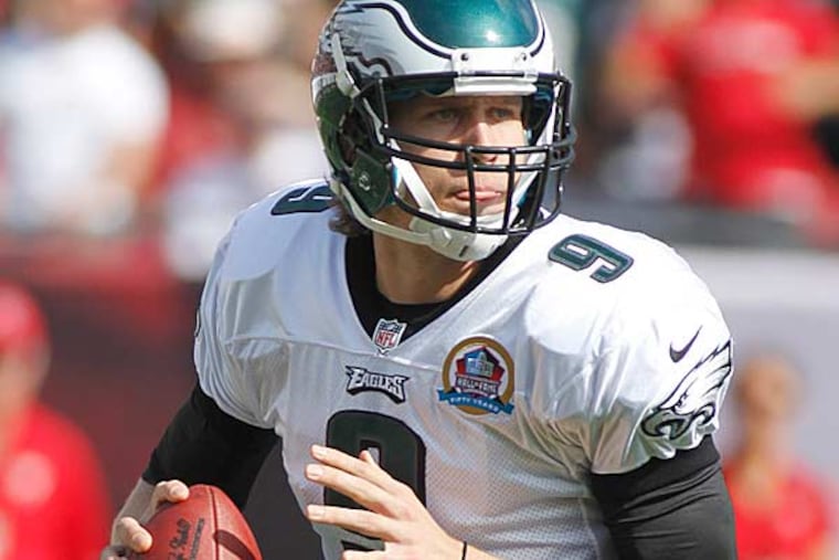 Nick Foles (9) looks to throw during the first half of an NFL football game between between Tampa Bay Buccaneers and the Philadelphia Eagles, Sunday, Dec. 9, 2012, in Tampa, Fla. The Eagles won 23-21. (Reinhold Matay/AP)