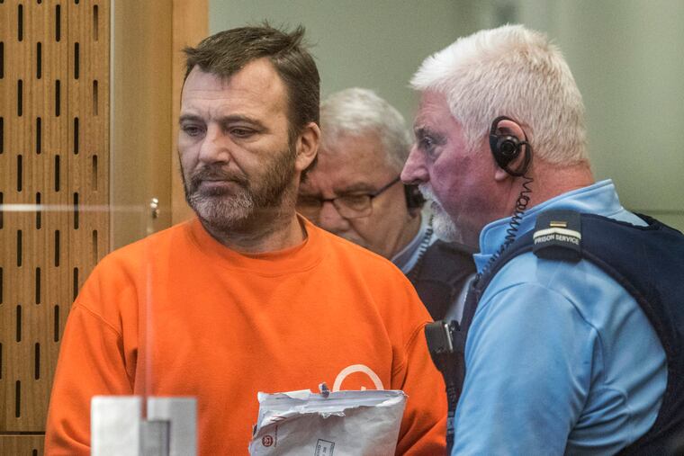 Philip Neville Arps (left) appears for sentencing in the Christchurch District Court, in Christchurch, New Zealand, Tuesday, June 18, 2019. The Christchurch businessman who shared a video of worshippers being slaughtered at a New Zealand mosque has been sentenced to 21 months in prison. (John Kirk-Anderson / Pool via AP)