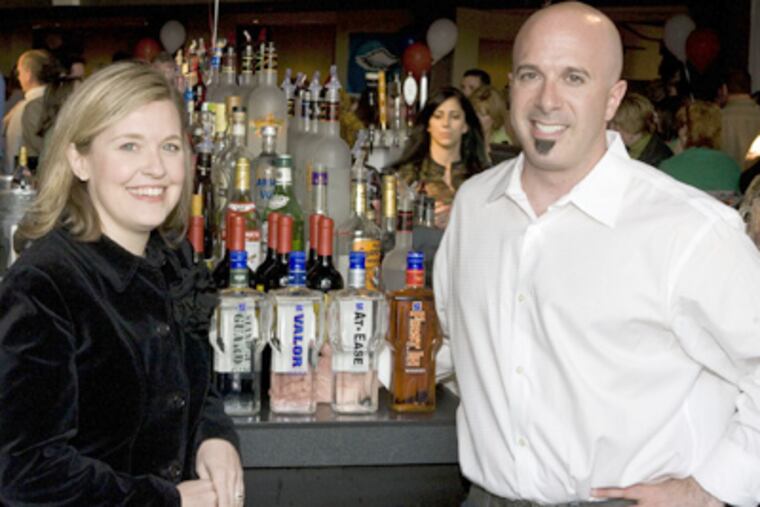 Jennifer Dempsey Fox and David Fox’s Brave Spirits line includes At Ease Rum, First In Whiskey, Valor Vodka, and Standing Guard Gin.(RAHUL COUTINHO / Staff Photographer)