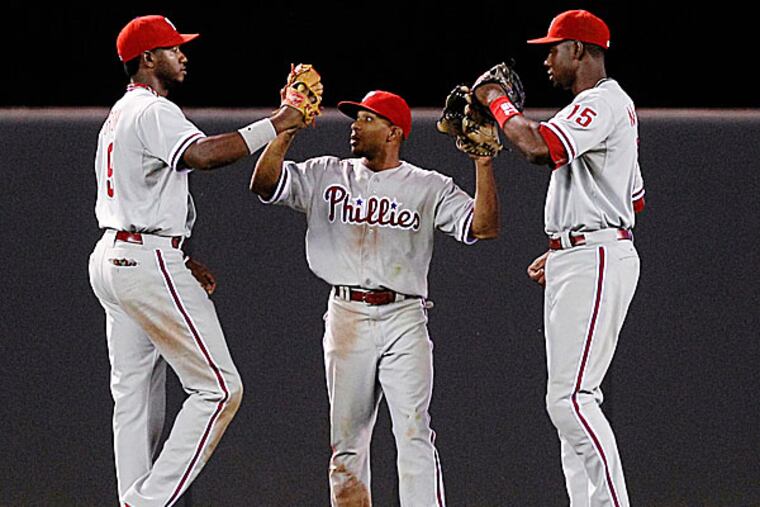 Phillies outfielders Ben Revere, Domonic Brown and John Mayberry Jr. (Genevieve Ross/AP)