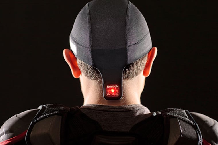 Today’s athletes can wear headgear equipped with mobile sensors that measure and report impacts — data that could raise crucial flags about potential concussions from hard hits in football, hockey or other sports. Reebok offers the technology in the $150 CheckLight created in partnership with MC10 Inc., of Cambridge, Mass. (courtesy photo)