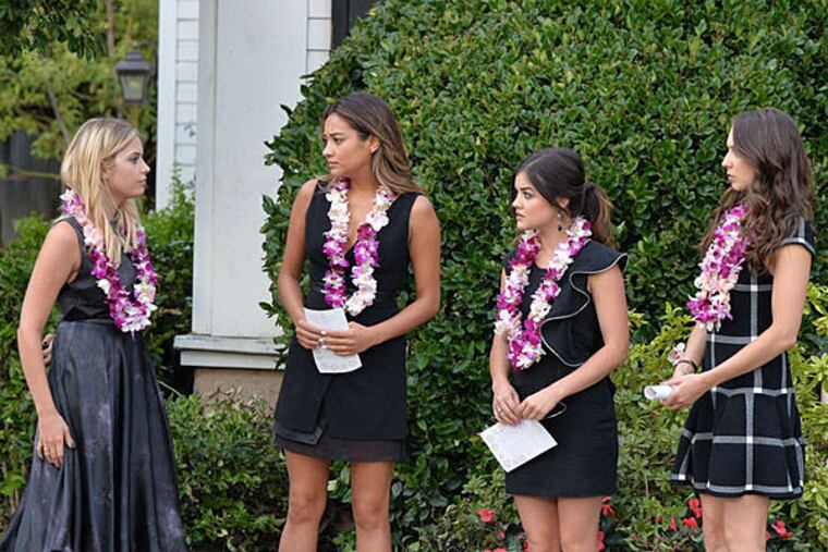 On "Pretty Little Liars," Aria, Emily, Hanna, and Spencer are determined to prove Alison killed Mona in "Through a Glass, Darkly," the winter-season premier. (ERIC McCANDLESS / ABC Family)