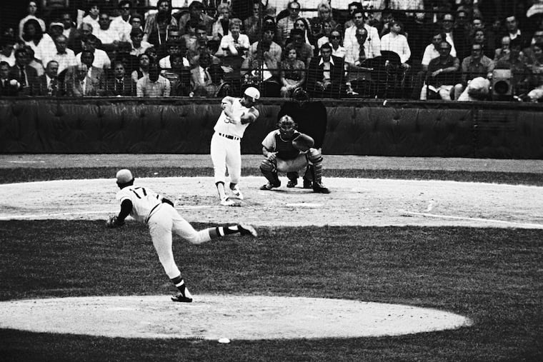Reggie Jackson follows through with his towering third-inning home run in the 1971 All-Star Game off Dock Ellis.