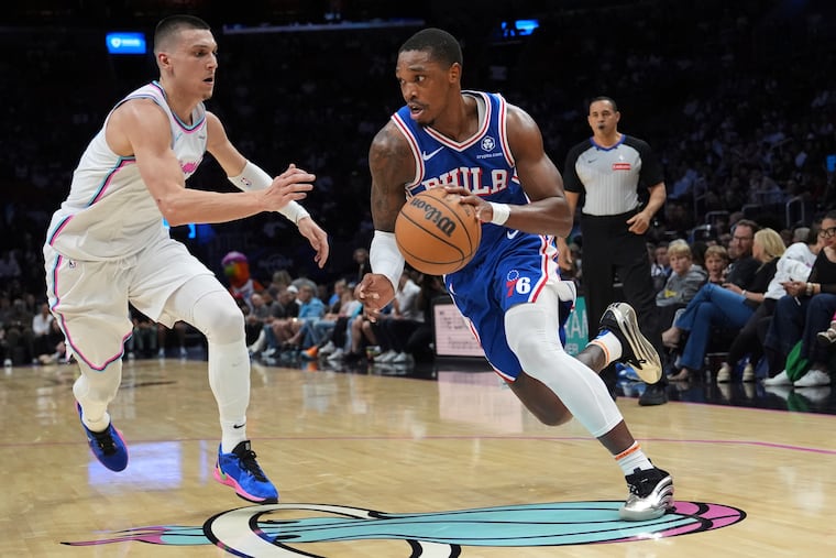 Sixers guard Lonnie Walker IV drives to the basket against Miami's Tyler Herro. Walker scored 29 points.