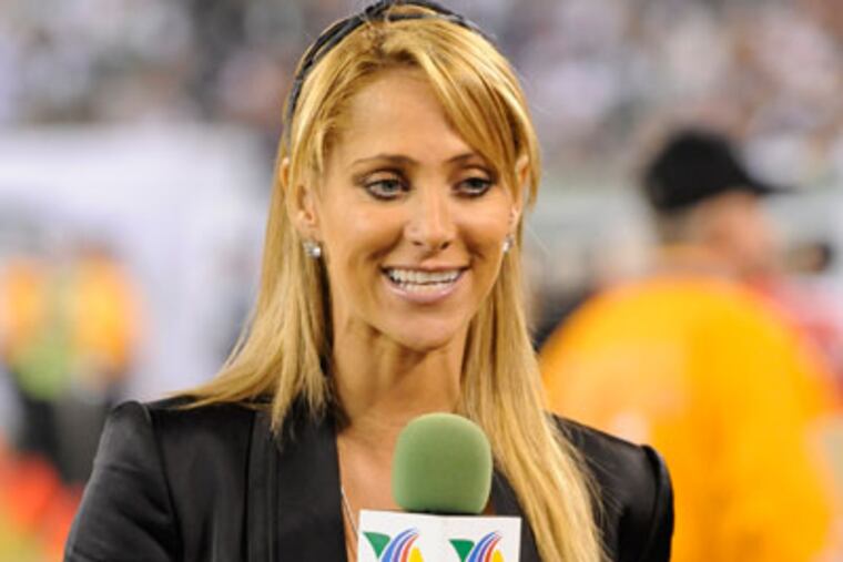 Ines Sainz, a reporter for the Mexican network TV Azteca, gestures while working on the sideline during the second quarter of an NFL football between the New York Jets and the Baltimore Ravens at New Meadowlands Stadium in East Rutherford, N.J., Monday, Sept. 13, 2010. Jets owner Woody Johnson said Monday that he apologized to Sainz for his players' reported treatment of her during and after practice Saturday. (AP Photo/Bill Kostroun)