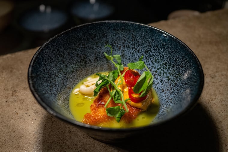 A daily special at Uchi: Crispy halibut in green tomato broth with pickled shimeji mushroom and remoulade.