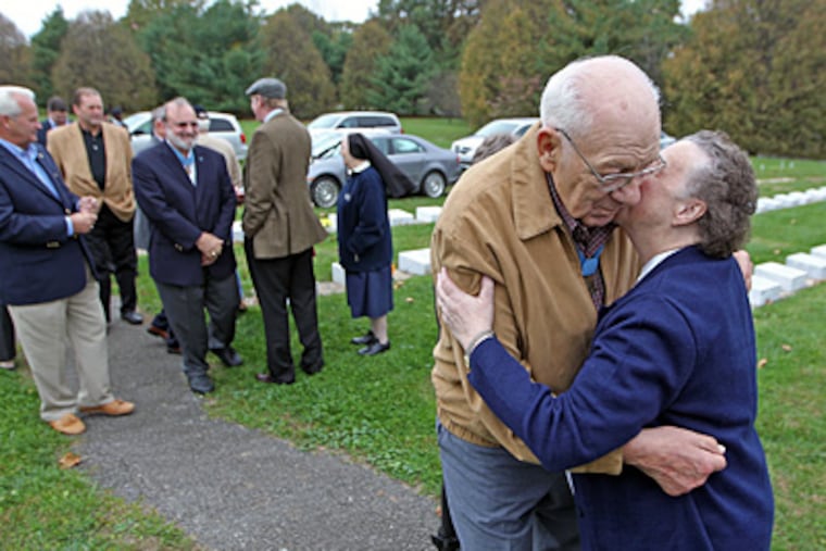 Sister Maria Consuelo embraces Medal of Honor recipient Hector A. Cafferata Jr., who with five other medal recipients laid a wreath Saturday at Sister Maria Veronica Keane’s grave. She served as a volunteer archivist at the Freedoms Foundation of Valley Forge for 17 years after she retired. (Michael Bryant / Staff Photographer)