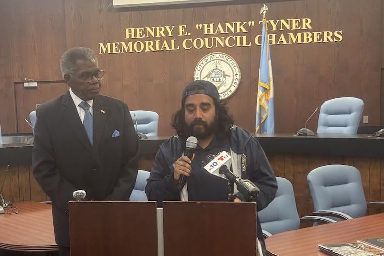 Cristian Moreno-Rodriguez, executive director of El Pueblo Unido of Atlantic City, speaks to the media and community representatives about recent ICE activity in the area on Dec. 23, 2025. At left Atlantic City Council Vice President Kaleem Shabazz.