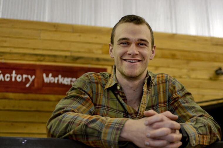 Tom Turcich, 25, is preparing for a five-year global walk. The Factory in Collingswood will hold a fund-raiser and send-off for him on Saturday. Deaths of two township residents inspired him to push himself. (TOM GRALISH / Staff Photographer)