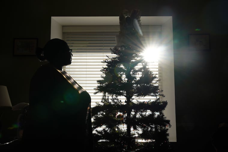 Janelle Avant in her home in Philadelphia. She shot an intruder who broke into her home but now fears the man could return. He's free on bail awaiting trial.