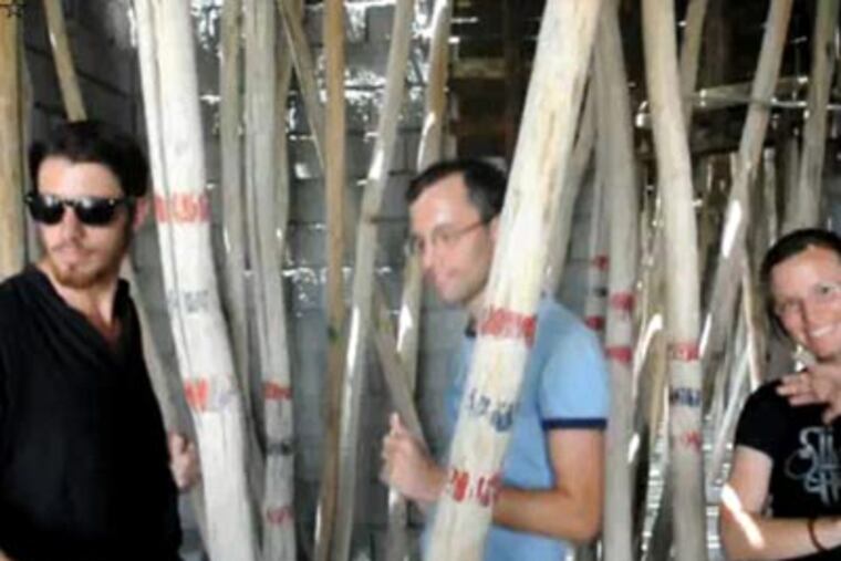 This image made from a July 29, 2009 video shows, from left: Josh Fattal, Shane Bauer and Sarah Shourd in the Kurdish city of Irbil, Iraq. (AP Photo/Shon Meckfessel)