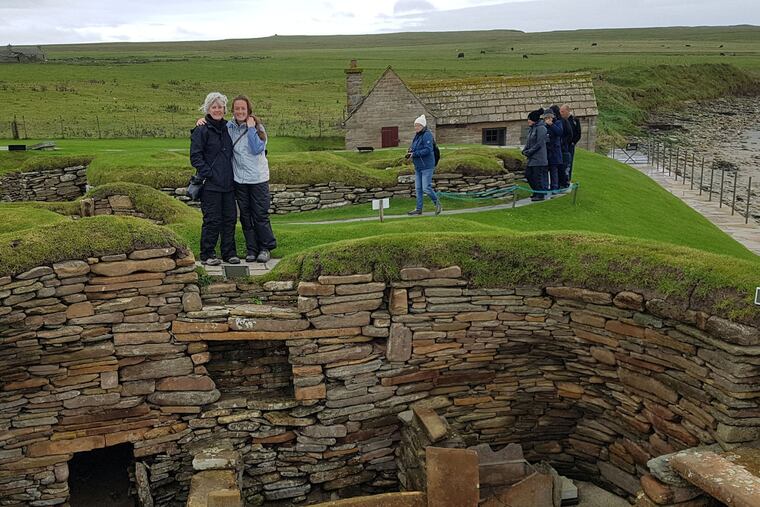 Taylor St. John with her mother, Jacqueline St. John, in Scotland's Orkney Islands at Skara Brae, part of the UNESCO-listed Heart of Neolithic Orkney.