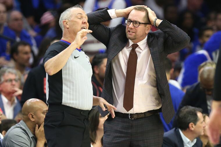 Nick Nurse, then-coach of the Raptors, questions the call of an official during their NBA playoff game at the Wells Fargo Center on May 2, 2019.