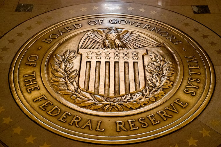 The seal of the Board of Governors of the United States Federal Reserve System is displayed in the ground at the Marriner S. Eccles Federal Reserve Board Building in Washington in 2018.