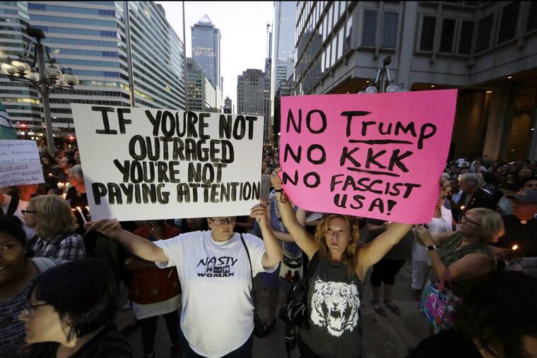 Stephanie Batter of Essington (left) and Shannon McDevitt of Cape May Court House at vigil/rally on Paine Plaza, across from City Hall in Philadelphia.