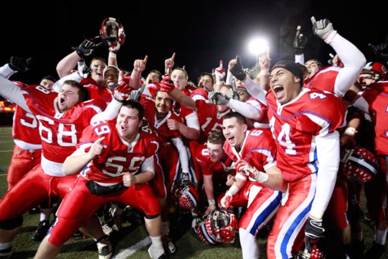 Neshaminy celebrates its Class AAAA District 1 title. (David Swanson/Staff Photographer)