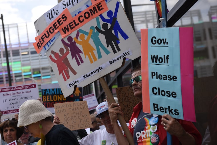 Ron Raz, 68, of Ferndale, protests outside of Gov. Tom Wolf's Philadelphia office at 110 N. 8th St. to call for the shutting down of Berks Family Detention Center on Tuesday, June 26, 2018.