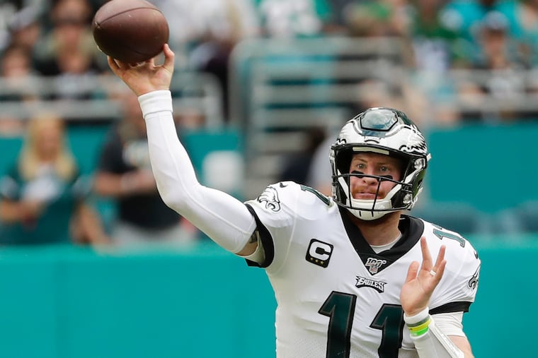 Eagles quarterback Carson Wentz throws the football against the Miami Dolphins on Sunday, Dec. 1, 2019, in Miami.