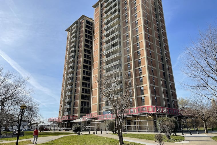 The three, 19-story towers at the Philadelphia Housing Authority's West Park site are in such poor repair, bricks and masory are falling from the facade. The scaffolding was erected to catch the debris.