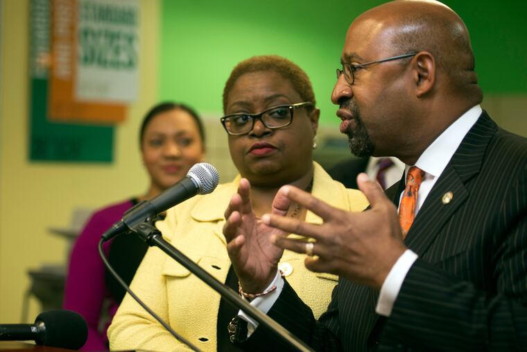 Mayor Nutter talks with reporters about the coming Democratic National Convention. The Rev. Leah
Daughtry of the DNC is beside him.