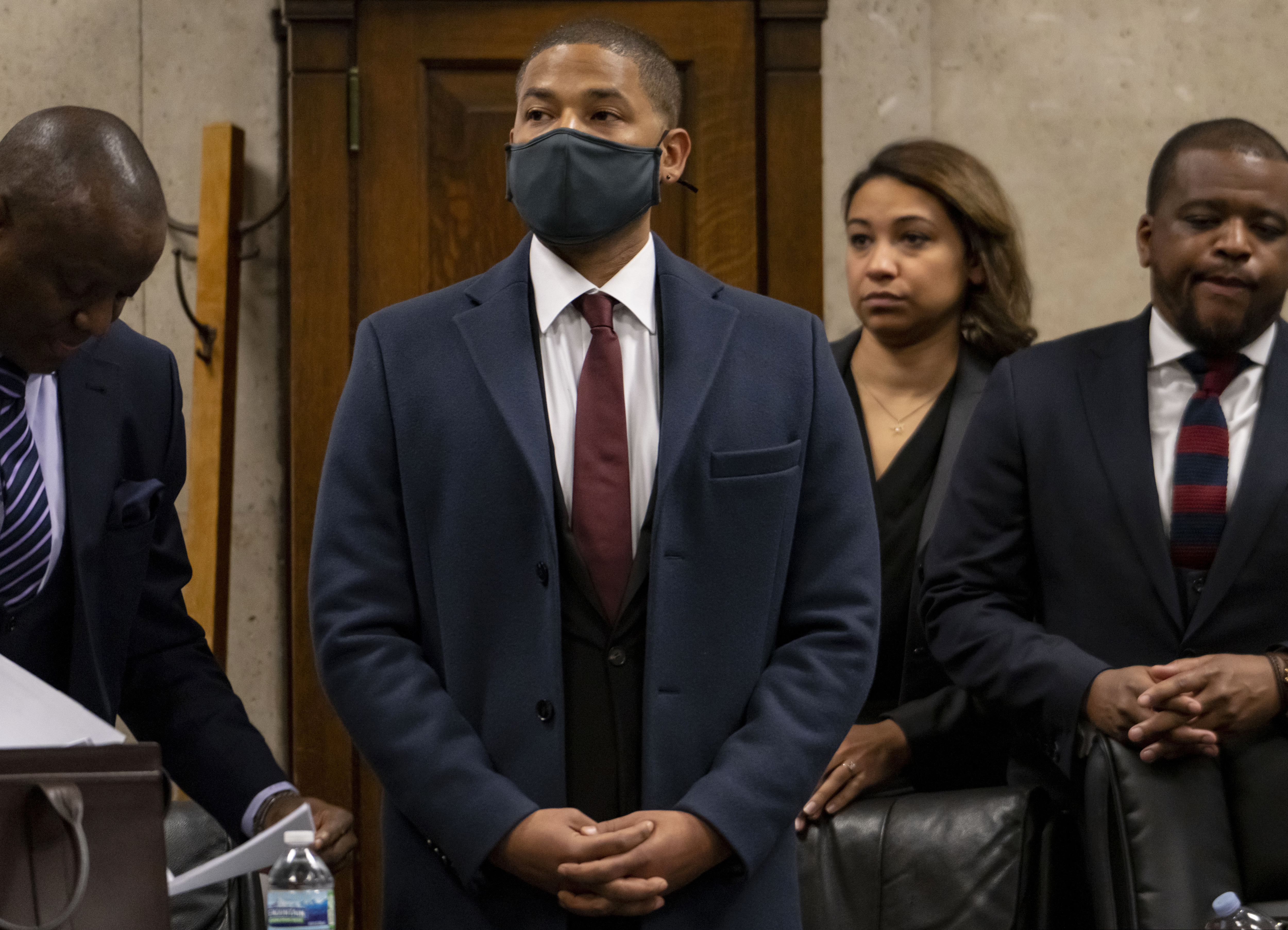 Actor Jussie Smollett appears with his attorneys at his sentencing hearing at the Leighton Criminal Court Building in Chicago.
