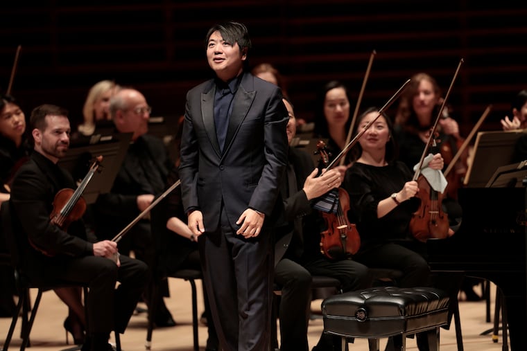 Lang Lang acknowledges the audience after being introduced by conductor Yannick Nezet-Seguin at the Kimmel Center’s Marian Anderson Hall in Philadelphia on Tuesday, April 7, 2026.