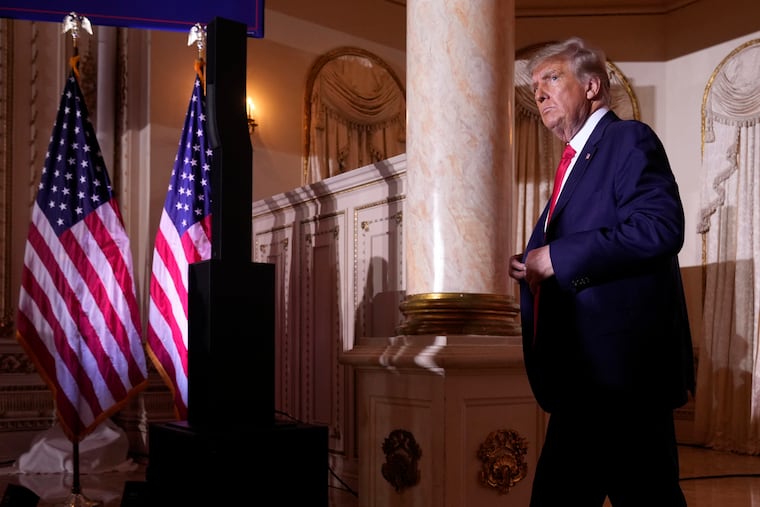 Former President Donald Trump departs the stage at his Mar-a-Lago estate Tuesday after announcing a third run for the White House.