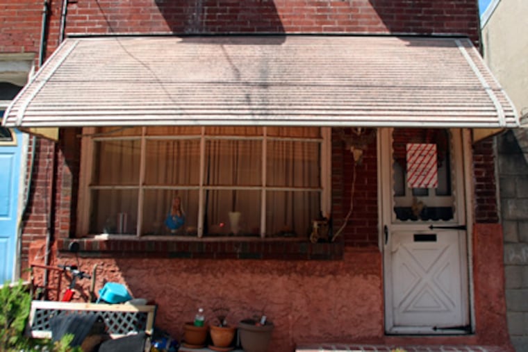 The PSPCA recently found 60 chihuahuas inside this Earp St. residence in South Philadelphia. (JONATHAN YU / Staff Photographer)