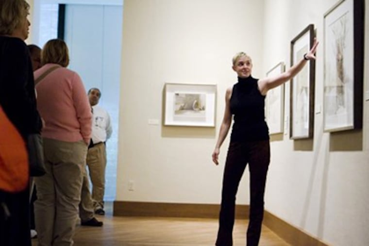 Victoria Wyeth guiding a tour group at the Brandywine River Museum in Chadds Ford, Chester County. Wyeth, 29, is the only grandchild of Andrew Wyeth. (AP Photo/Matt Rourke)
