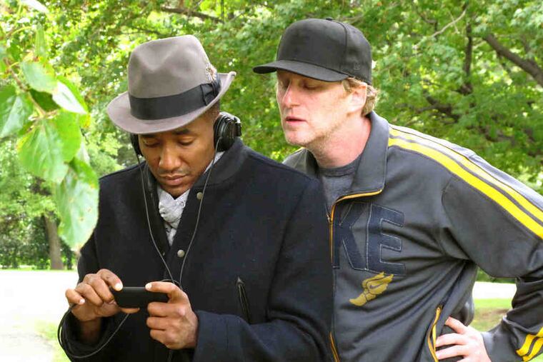 Director Michael Rapoport (right) with Q-Tip of A Tribe Called Quest. Rapoport followed the group on its reunion tour for a film, which became "emotionally charged."