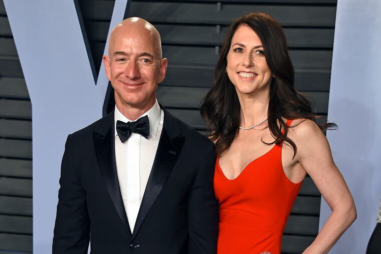FILE - In this March 4, 2018 file photo, Jeff Bezos and wife MacKenzie Bezos arrive at the Vanity Fair Oscar Party in Beverly Hills, Calif. Bezos says he and his wife, MacKenzie, have decided to divorce after 25 years of marriage. Bezos, one of the world’s richest men, made the announcement on Twitter Wednesday, Jan. 9, 2019.