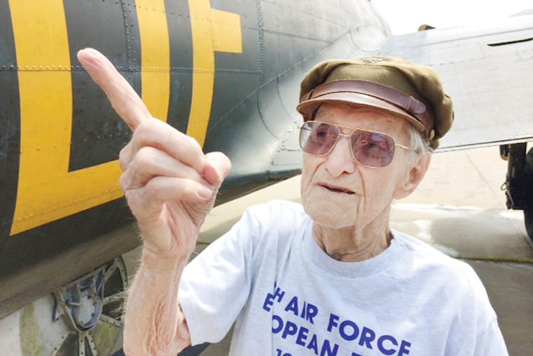 Standing next to a B-17 Flying Fortress at Northeast Airport, former ball turret gunner Joe Blinebury, 95, recounts his experiences in the flak-filled skies of Europe during World War II. STU BYKOFSKY / DAILY NEWS STAFF