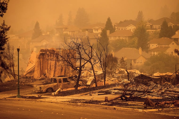 Homes leveled by the Glass Fire line a street in the Skyhawk neighborhood of Santa Rosa, Calif. in September. On Friday, President Donald Trump’s administration approved a previously rejected California application for disaster relief funds to clean up damage from six recent wildfires.