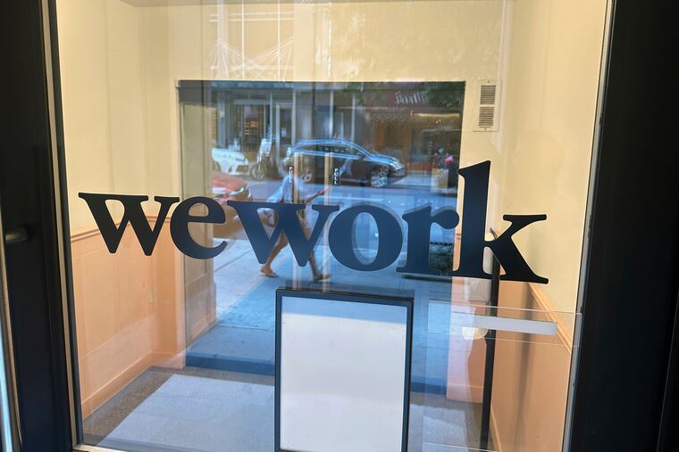 A sign for a WeWork workspace-sharing office in New York on Aug. 9, 2023.