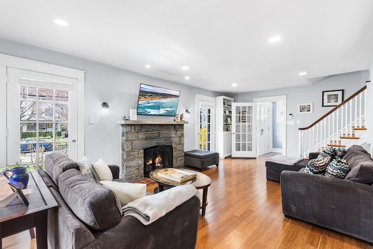 The living space in the Havertown house has a working gas fireplace.