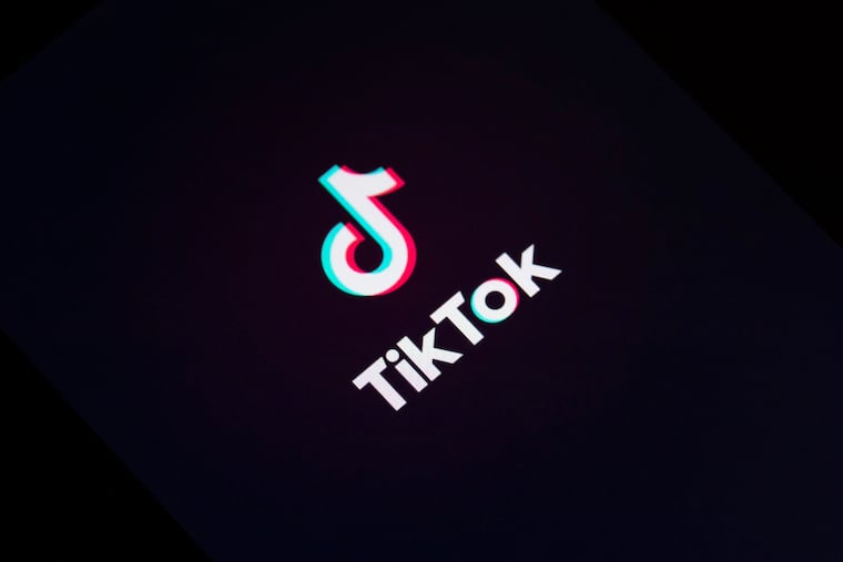 A TikTok logo on a mobile device