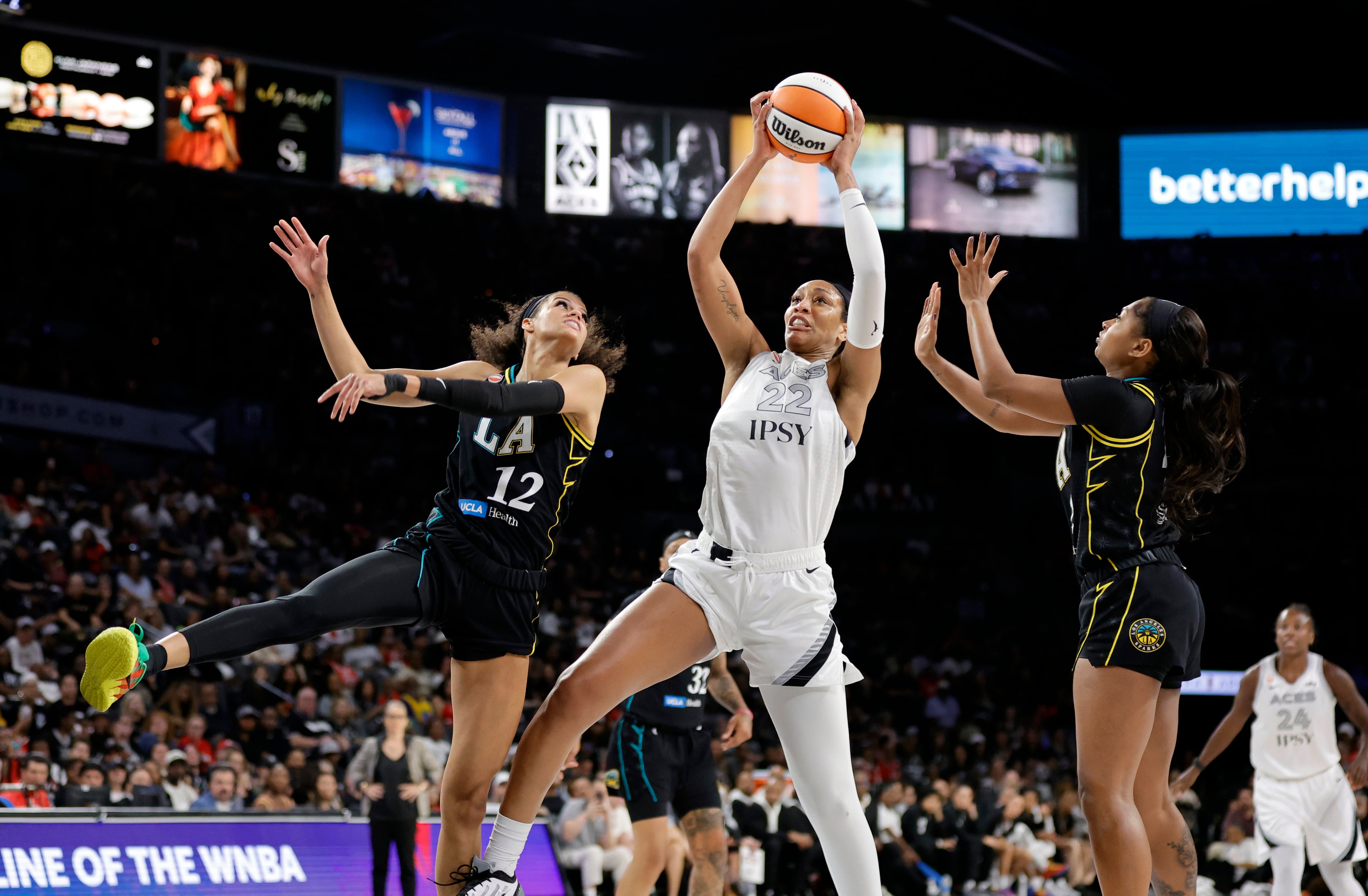 A'ja Wilson powers the Aces past the Sparks, clinching at least a No. 3 seed