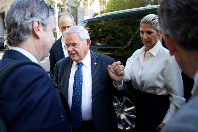 Democratic U.S. Sen. Bob Menendez of New Jersey and his wife Nadine Menendez arrive to the federal courthouse in New York on Wednesday.