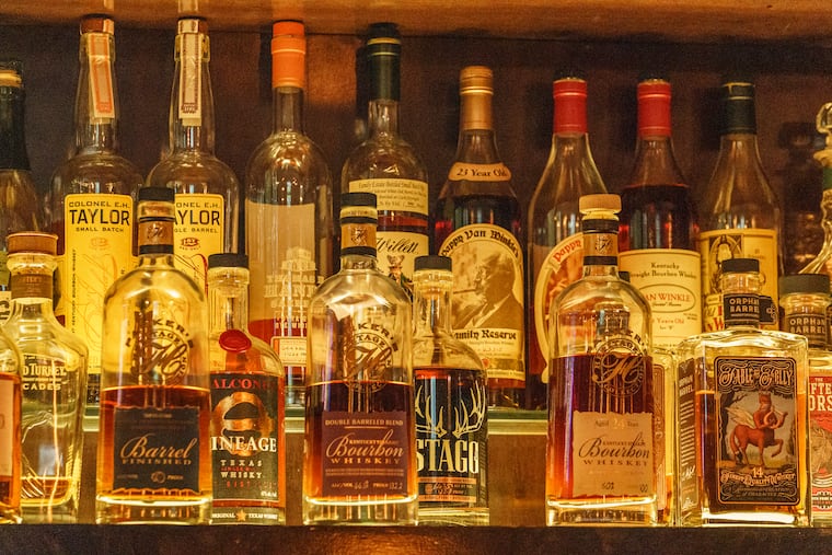 A collection of bottles of Pappy Van Winkle bourbons (top shelf, right) among other fine whiskies at the Far Bar, located in the historic Far East Building in the heart of Little Tokyo in Los Angeles.