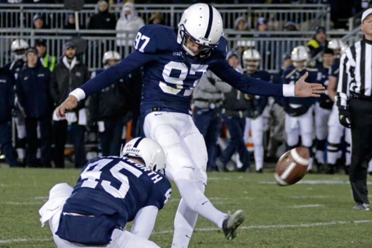 Penn State kicker Sam Ficken (97) misses on a field goal attempt in overtime during an NCAA college football game against Nebraska in State College, Pa., Saturday, Nov. 23, 2013. Nebraska won in overtime 23-20. (Gene J. Puskar/AP)