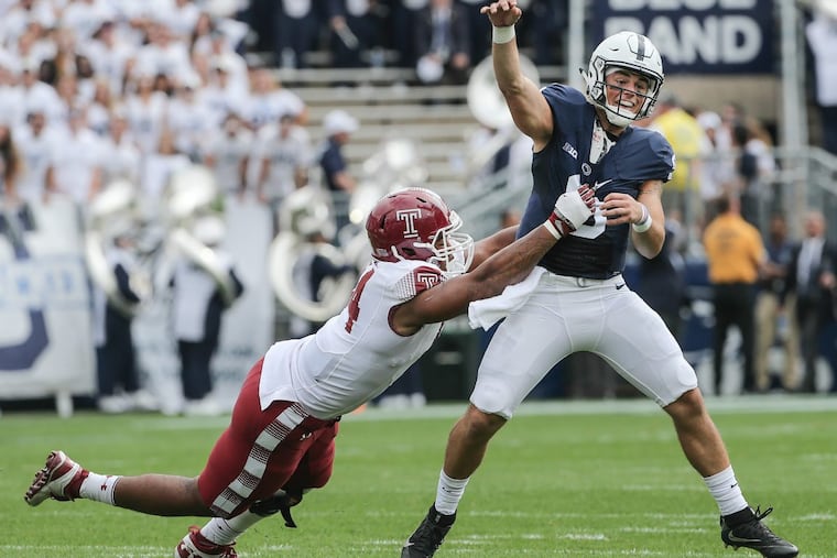 Temple's Jullian Taylor putting pressure on as Penn State QB Trace McSorley throws an incompletion last September.