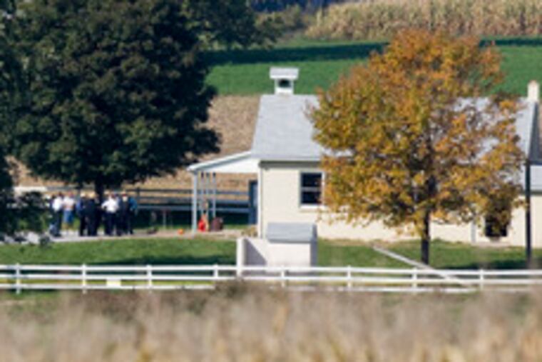 Days after the massacre last Oct. 2, a group visited the school where the gunman killed five students, and then himself.