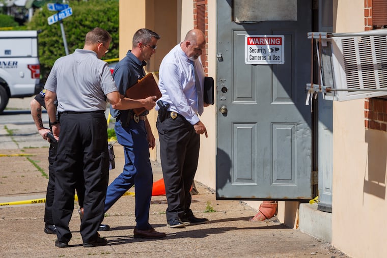 Chester Police investigate a fatal shooting at Delaware County Linen on West Fourth Street in Chester on Wednesday. A man whom Delaware County District Attorney Jack Stollsteimer described as a "disgruntled employee" opened fire in the business, killing two of his coworkers and wounding three others, police said.