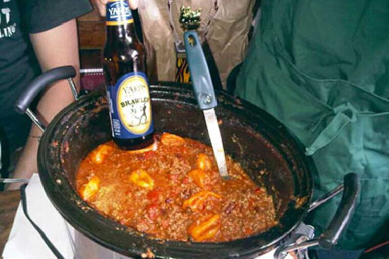 Dave Kovalchick's chili earned him a people's choice award at Khyber Pass Pub's cook-off.