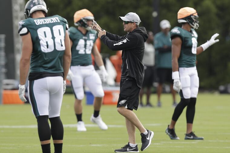Eagles Special Teams Coordinator Dave Fipp instructs special team members during training camp at the NovaCare Complex in South Philadelphia on Sunday, July 29, 2018. YONG KIM / Staff Photographer