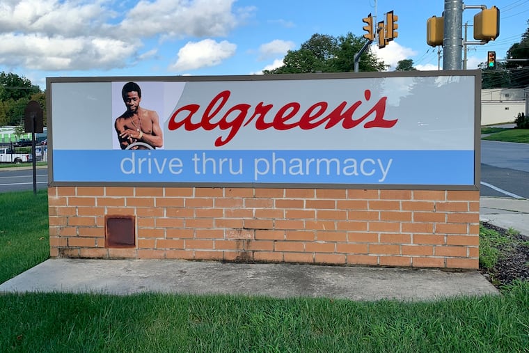 West Chester street artist Cassius King installed sticker art on top of a Walgreens in Bradford Plaza to read, "algreen's." The sticker was removed after four days.