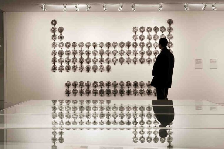 In "Elemental Matters" at the Chemical Heritage Foundation is Canadian artist David Clark's "I don’t think you understand the way I feel about the stove" made of 118 old electric-stove coils. The show is part of the U.S. launch of the 2011 International Year of Chemistry. (Photo: Conrad Erb)
